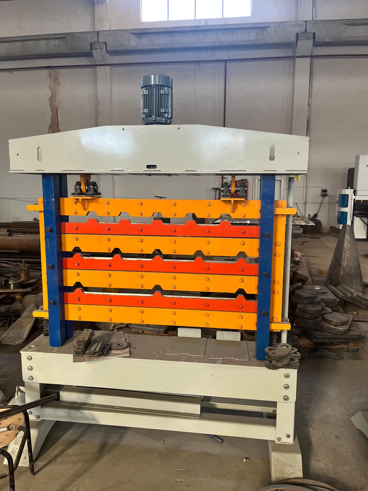 Ridge-cap machine